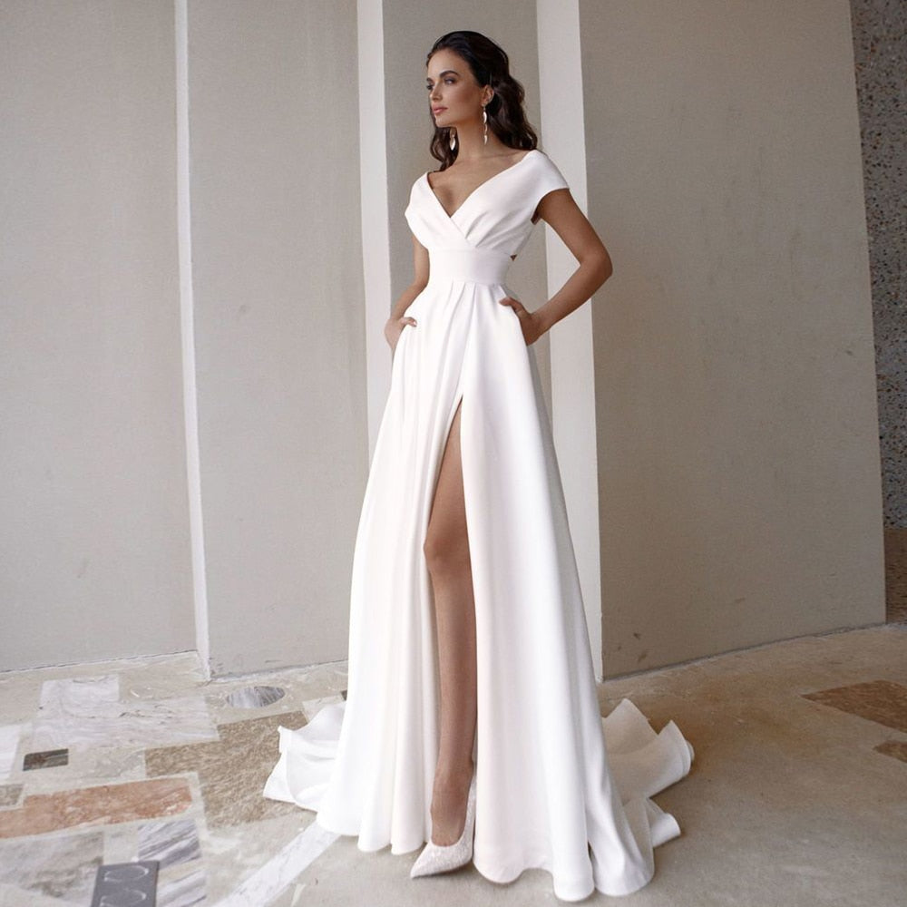 Modest V-Neck Short Sleeve Sweep Train Slit A Line Bridal Gown with Pockets Wedding Dress